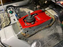 After way too much work, I finally got the transmission tunnel hump off of the donor car.  Look at all of those big holes I had to drill.