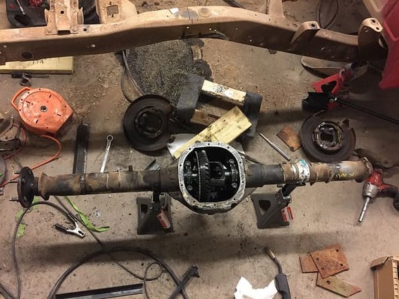Got the rear end tore apart, driver side axle tube cut and rewelded to length.