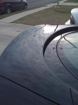 After repairs.  There used to be about a 3&quot; gouge literally in the middle of this spoiler. . .