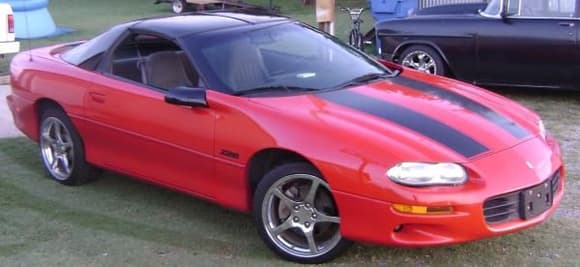 99 camero LS1, I have powder coated the rims black,and painted calipers red.Done a few mods to engine and will continue till I'm happy with it.