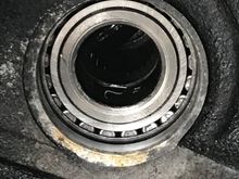 Seal removed. Ball bearings look clean. Small nick on left side of the inner tube/ shaft not sure what to call it. 