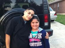 My baby cuzin Luvs taking a ride in my Hummer