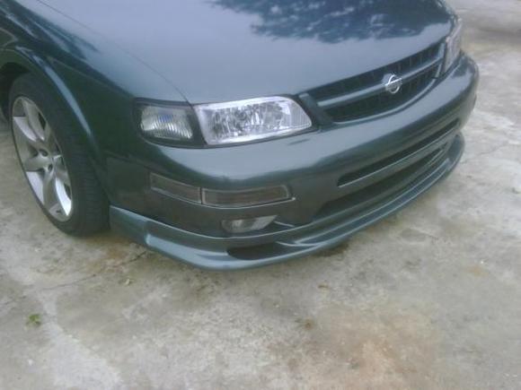 Had to put in fake headlights out of cardboard when doing retro fit lol, illusion of real headlights