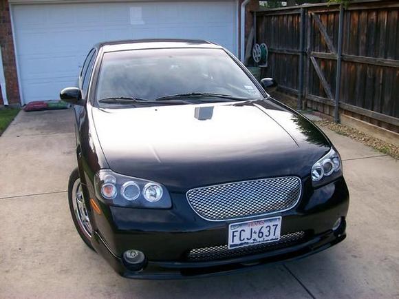2001 Maxima, Stillen body kit, Street Scene Speed grill, Projector Halo Headlights