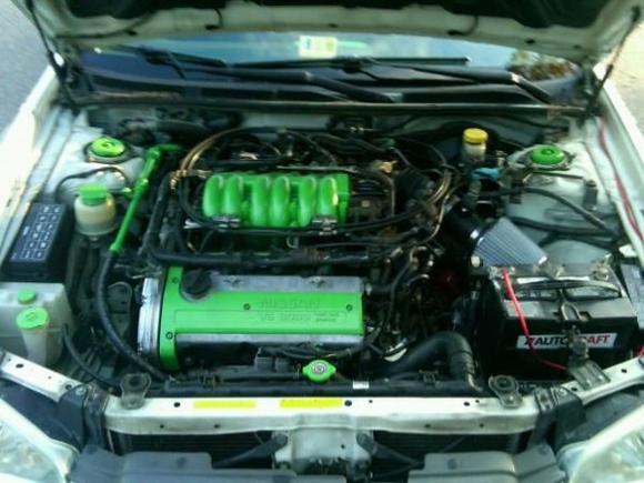 Under the hood just a few lime green pieces. Before i added the weapon r intake.