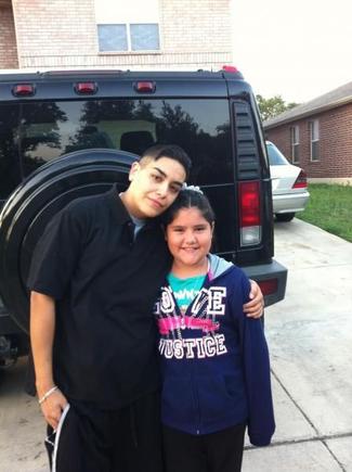 My baby cuzin Luvs taking a ride in my Hummer