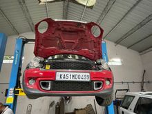 Car sitting on the post lift.