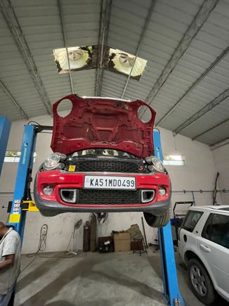 Car sitting on the post lift.