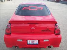 custom show plate. full bow tie once again supplied from within.....note "TAZ" and Bow tie's tattoo's on stock tail lights.... Magnaflow tips