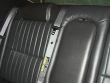 Rear Bench: Upper half in the middle and on the passengers side