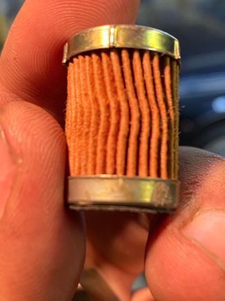 This is the fuel filter I pulled out, looked pretty clean. Spayed with compressed air and reinstalled. 