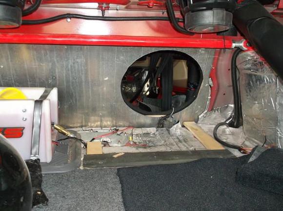 Trunk firewall opened to access existing wiring and route new water meth lines etc.  Note W / Meth storage tank...