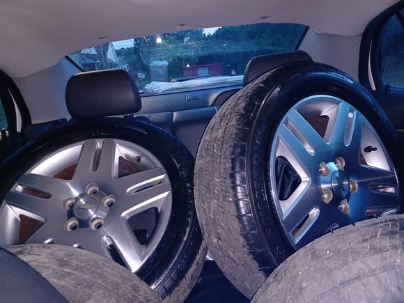 New rims and tires. Wife is bringing them home in her Malibu. Great girl.