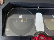 The gauge tipping from a melted mount. 