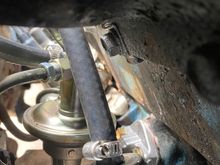 Here's a side view of the pump, you can see the top of the new fuel filter too. Just a cheapie from O'Reilley