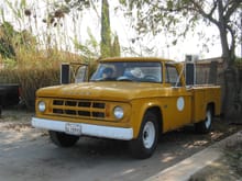 My 1968 Dodge D200... This gal had a 440 W/727.. I used it to haul my stuff to the races back about 18 years ago. I also had plenty of parts and loaner tools to make money at the Race Track... You know.. ( Hay BOB, You got some wire and some connectors!!) Yep !! "Hay BOB, You got a toggle switch" Yep.... Good Times.... :) This got away for a song and a dance with a 18' Equipment trailer... it went for $6,000.00... :)