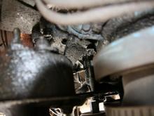 bottom up view of where the ground attaches to the engine.