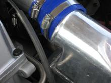 And this is what happens when you use spare parts and don't travel with enough replacement parts and/or tools. The coupler hose between my I/C tank and TB kept blowing off after I left the line. It made for really slow qtr times and speeds so along with other improvements, the Clown Car is down right now.