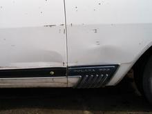 dents in door and front fender