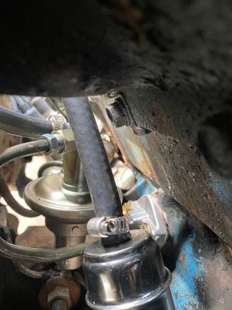 Here's a side view of the pump, you can see the top of the new fuel filter too. Just a cheapie from O'Reilley