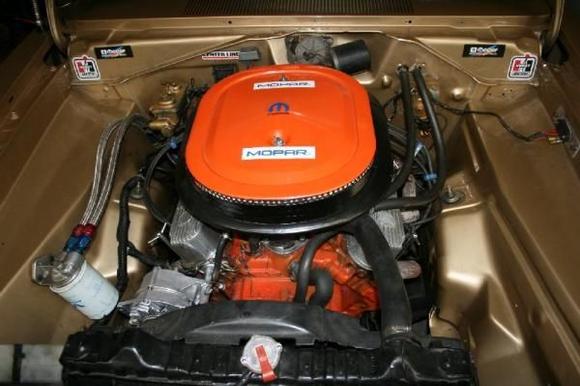 heres my 340 six pac in my Barracuda