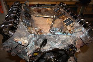 Intake gone, now whats under this valley pan I wonder.