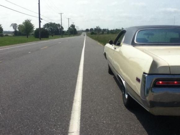 Don't let her gargantuan girth fool you. This is the view one unsuspecting (AND very very foolish) owner of a shiny 69' Camaro 350 RS got to see on my way back from the city one summer morning. Never in my life have I ever seen a Chevy guy have so much disgust and disappointment on his face...hahahahaha. Imaging your proud pony car outgunned by an old but well kept fleet command ship.