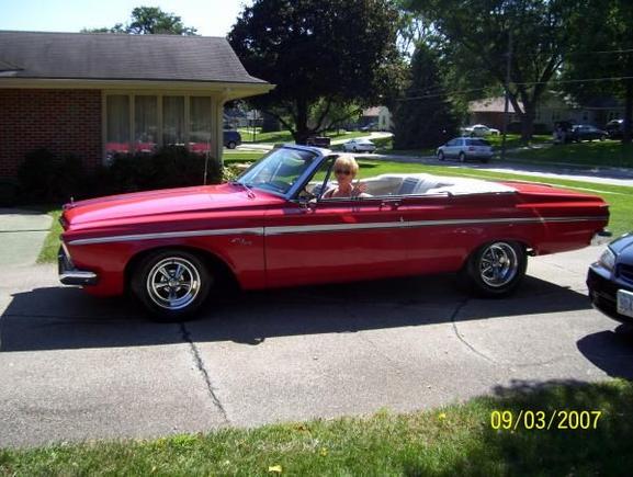 63 fury cnv..MaxWedge-II original motor from my 64 Drag
car (above).727 pushButton,3:55 RR,cragars. love cruzn in summer around DesMoines,Iowa, except for the 100  octane
I have to buy. still fun..my wife loves it!!