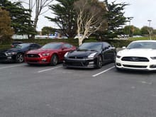 So I got off work and saw that my coworkers parked around me.  My coworker's black v6 mustang, my general sales manager's gtr, anf my finance manager's 50th anniversary 5.0