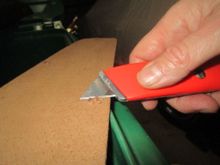 Trimming Masonite 'bloom' on back side of panel