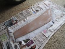 Vinyl and Masonite sprayed with glue