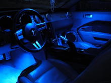 Blue LED map lights, LEDGLOW Blue Interior kit and lots of Billet.  The LEDGLOW lights in the footwells is new.