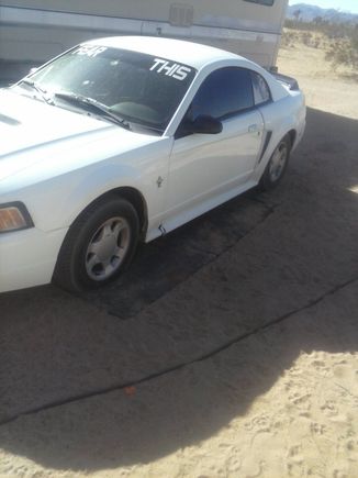 Left side profile. Rocker panel was broke when i bought the car. Older pic