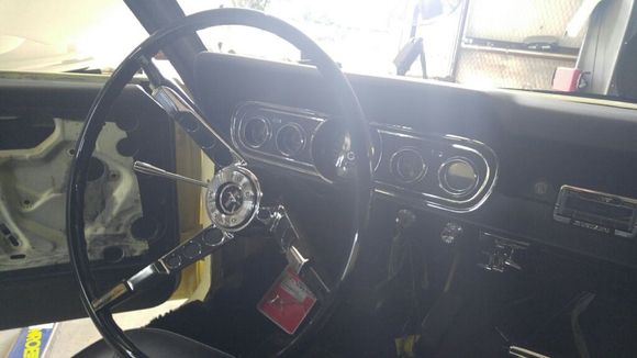 New steering wheel, horn Gauge bezel and chrome trim.