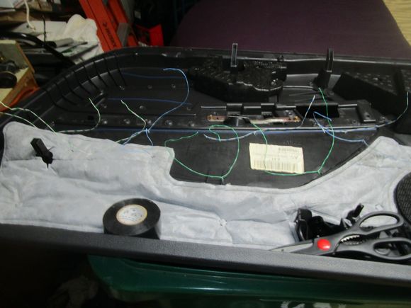 Wires tied off on back of door panel
