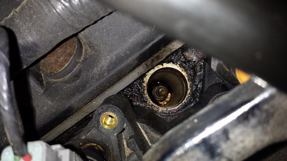 Engine misfire and Coolant in spark plug housing
