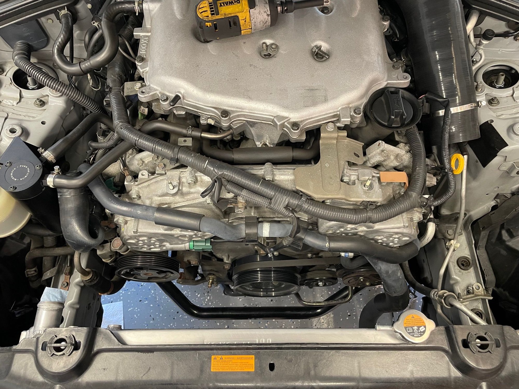 Engine Bay with components removed to access alternator.