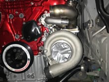 Here is a teaser photo of the turbo in place but after tearing through the engine bay I decided I wanted to change the manifolds so that they don’t run right next to the beautiful timing cover. The turbo location won’t change but the wastegates will move to the back and make more room for turbo intake and output 