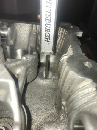 There are 2 problems one is that the studs sit too high and will contact the camshaft unless the front 2 and rear 2 studs of each cylinder head are set 2-3mm deeper in the block that means that when you drill out the old threads in the block you need to increase the depth of the hole by 2-3 mm. It should be noted that if you go to far coy could drill into one of the oil lines in the block and you don’t want to do that