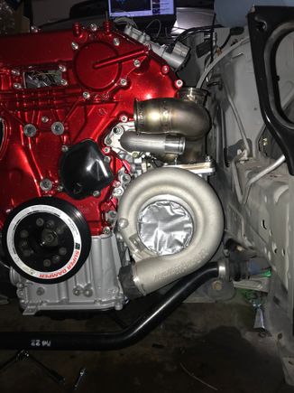 Here is a teaser photo of the turbo in place but after tearing through the engine bay I decided I wanted to change the manifolds so that they don’t run right next to the beautiful timing cover. The turbo location won’t change but the wastegates will move to the back and make more room for turbo intake and output 