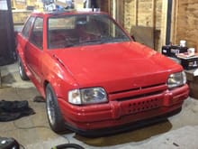 had a standard bonnet re-sprayed Rosso red. will eventually remove the bonnet spacers as well
