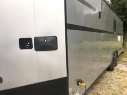 28 ft. Nomad car trailer with living quarters