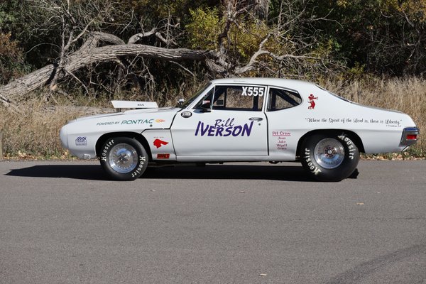 1970 Pontiac Tempest Sedan with enclosed race trailer
