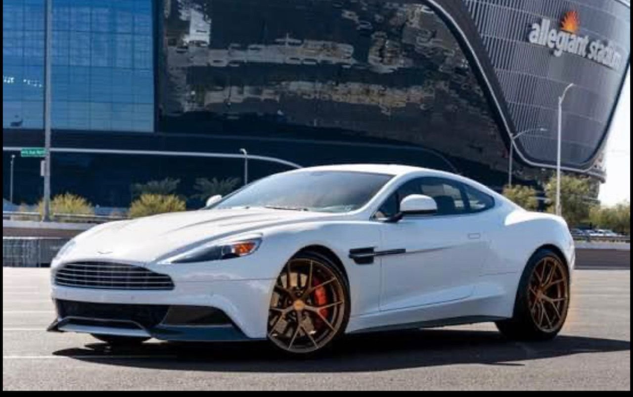 2014 Aston Martin Vanquish - 2014 Aston Martin Vanquish - 11k miles, $311k sticker, VelocityAP exhaust immaculate! - Used - VIN SCFLDCFP7EGJ01690 - 11,900 Miles - 12 cyl - 2WD - Automatic - Coupe - White - Las Vegas, NV 89128, United States
