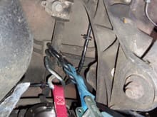 Straps hung from rear anti-sway bar, as per WSM.
