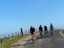 peloton arrives the top of hill