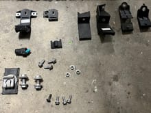 Broken parts being lined up with new ones. 