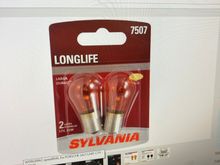 Sylvania 7507 long life pair about $7 at autozone