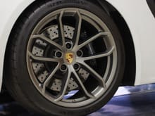 Satin Platinum wheels seem to match the brake hat better.