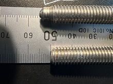 Th end of M8x55 oval head screw (p/n: 999-073-913-31) has this weird dog point for the additional 5mm length.